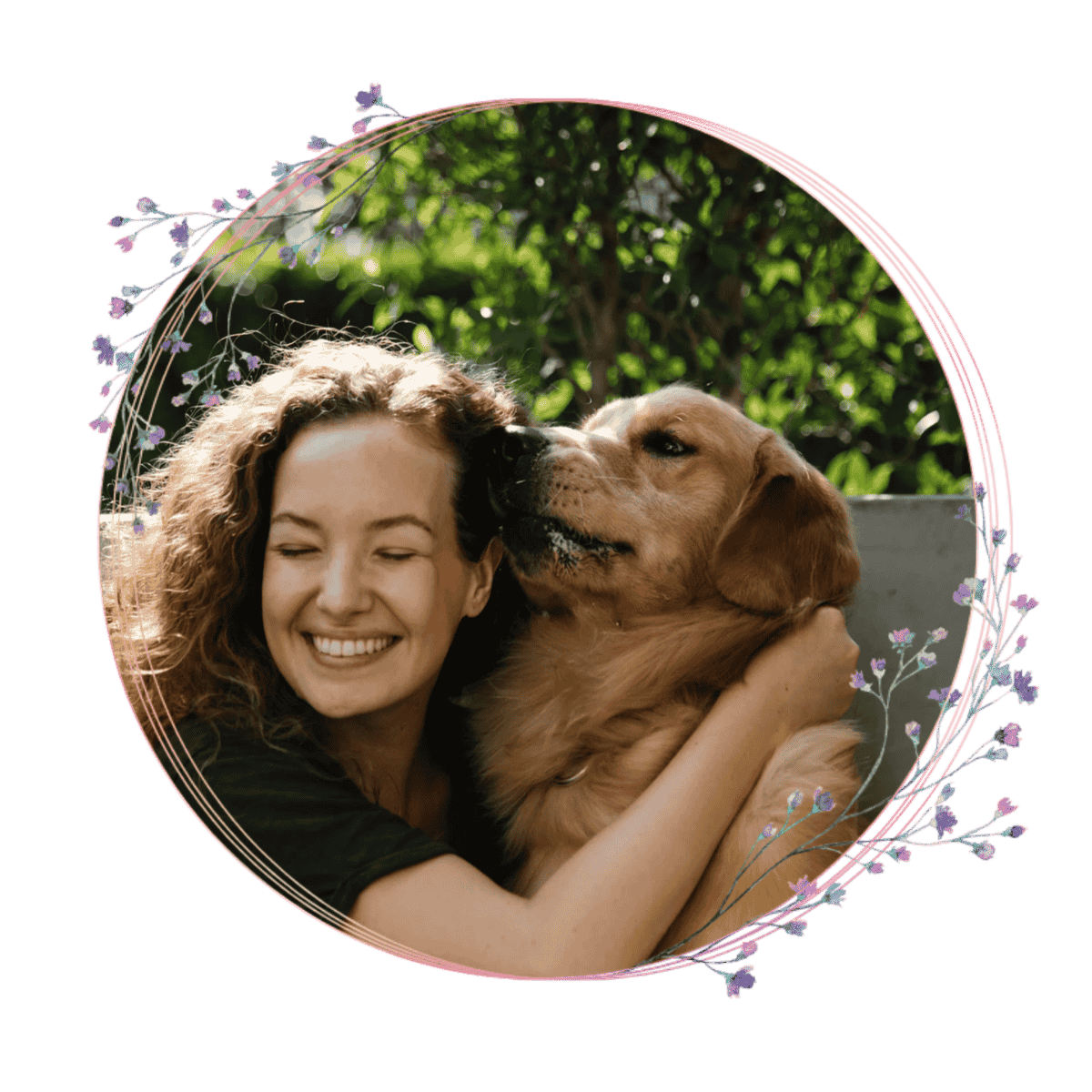 a person hugging a golden retriever