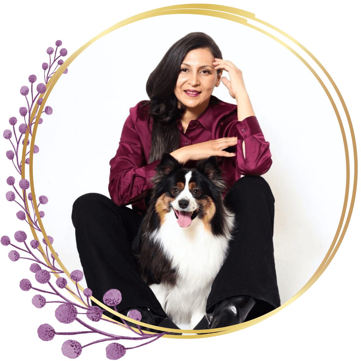 portrait of Dr. Heba with her happy dog inside a floral themed circular frame
